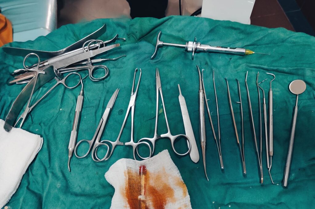 An apicoectomy seals the root tip from outside when retreatment cannot reach it