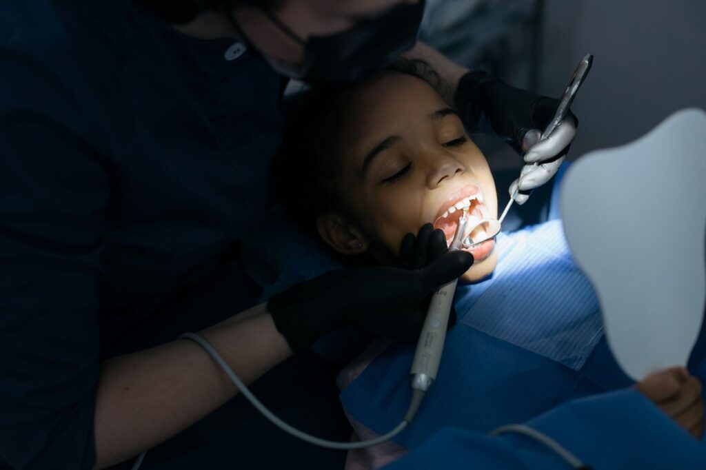 A pulpotomy treats the crown portion of the pulp and leaves the rest