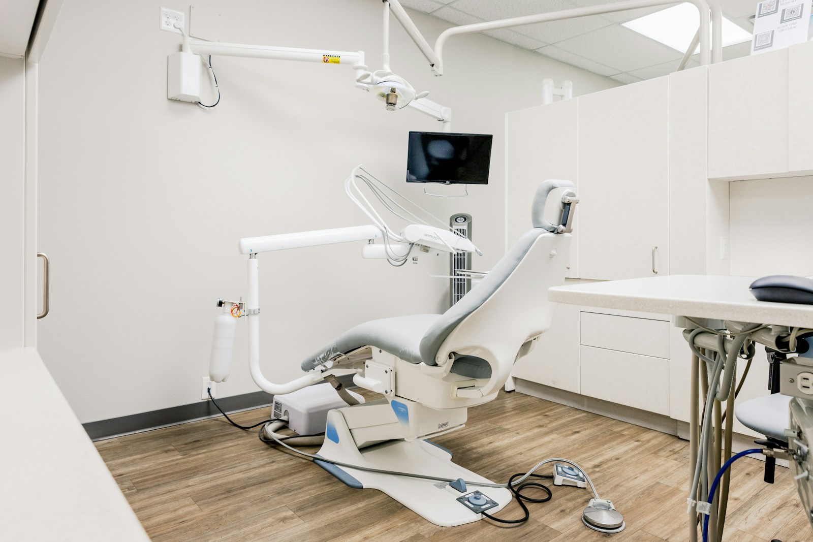 Bright, modern dental treatment room with advanced equipment