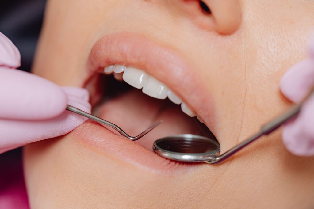 A deep, narrow pocket points to a periodontal origin