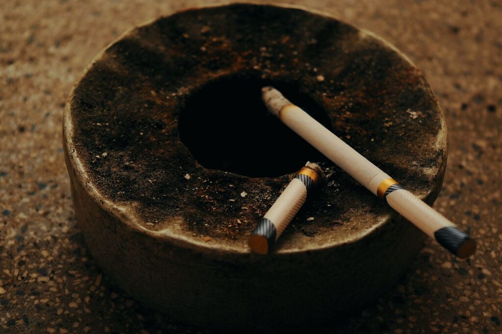 Smoking is associated with poorer healing and more retained lesions